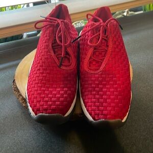 Nike red low top Jordan shoes